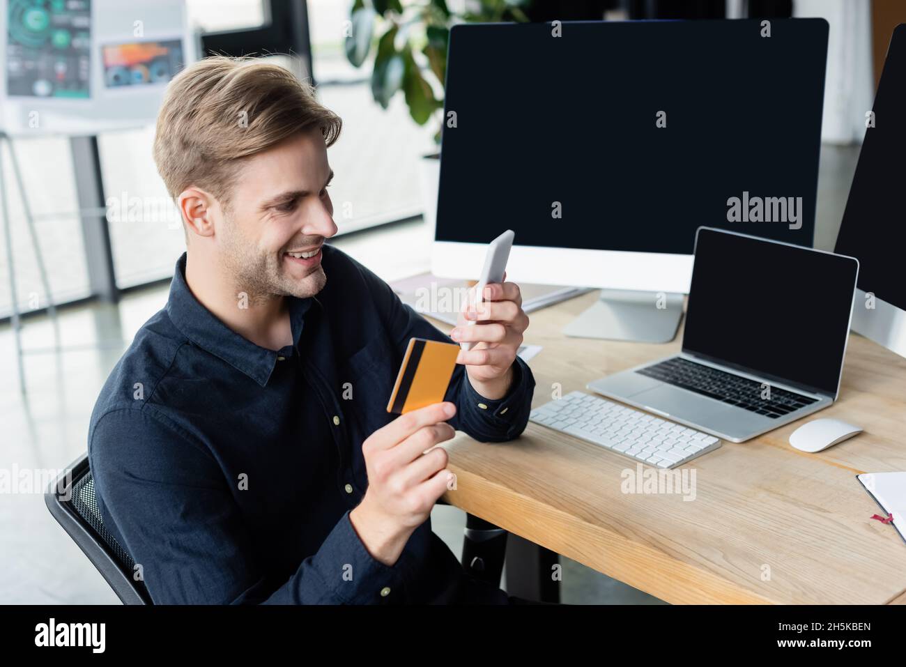 Credit card near computers hi-res stock photography and images - Alamy