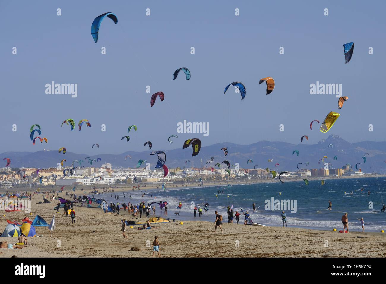 Los Lances beach overcrowded with kitesurfers. Tarifa, Costa de la Luz, Cadiz Province, Andalucia, Spain Stock Photo