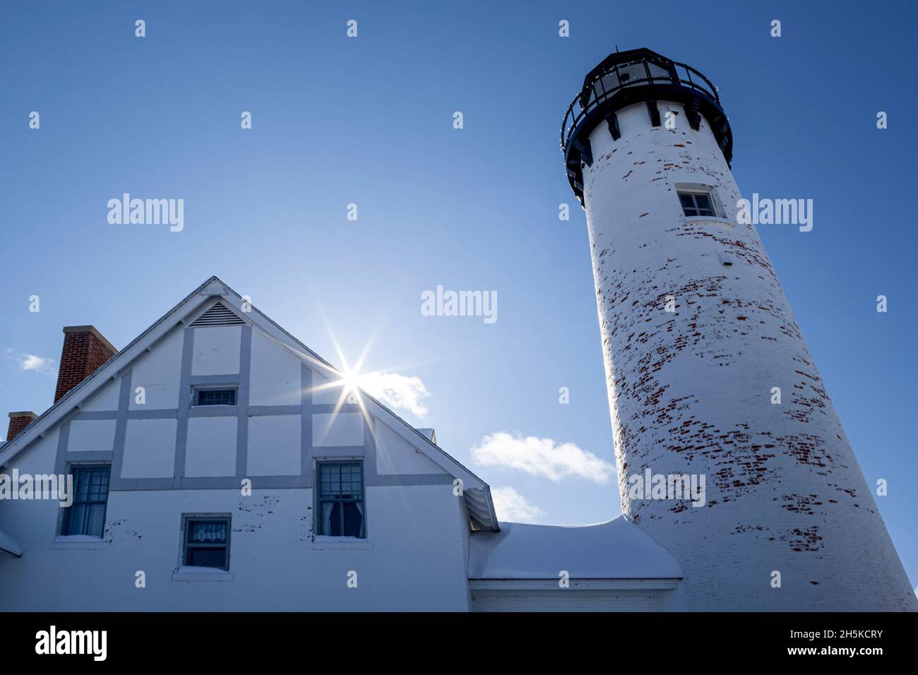 Point Iroquois Light against a bright blue sky; Michigan, United States of America Stock Photo