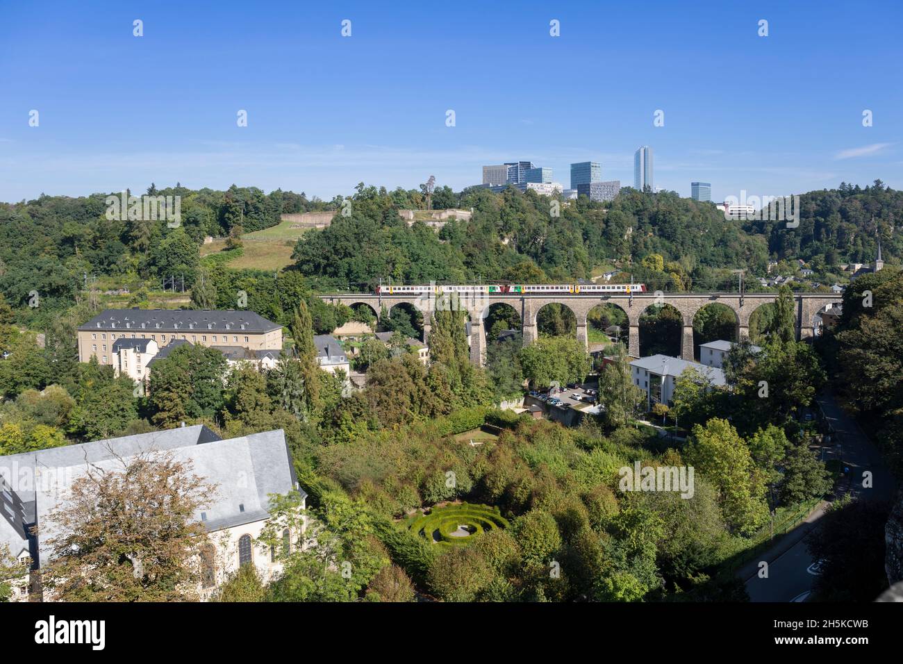 Europe, Luxembourg, Luxembourg City, Pafendall, Views of the Kirchberg with Viaduct carrying a Local Passenger Train across the Alzette River Stock Photo