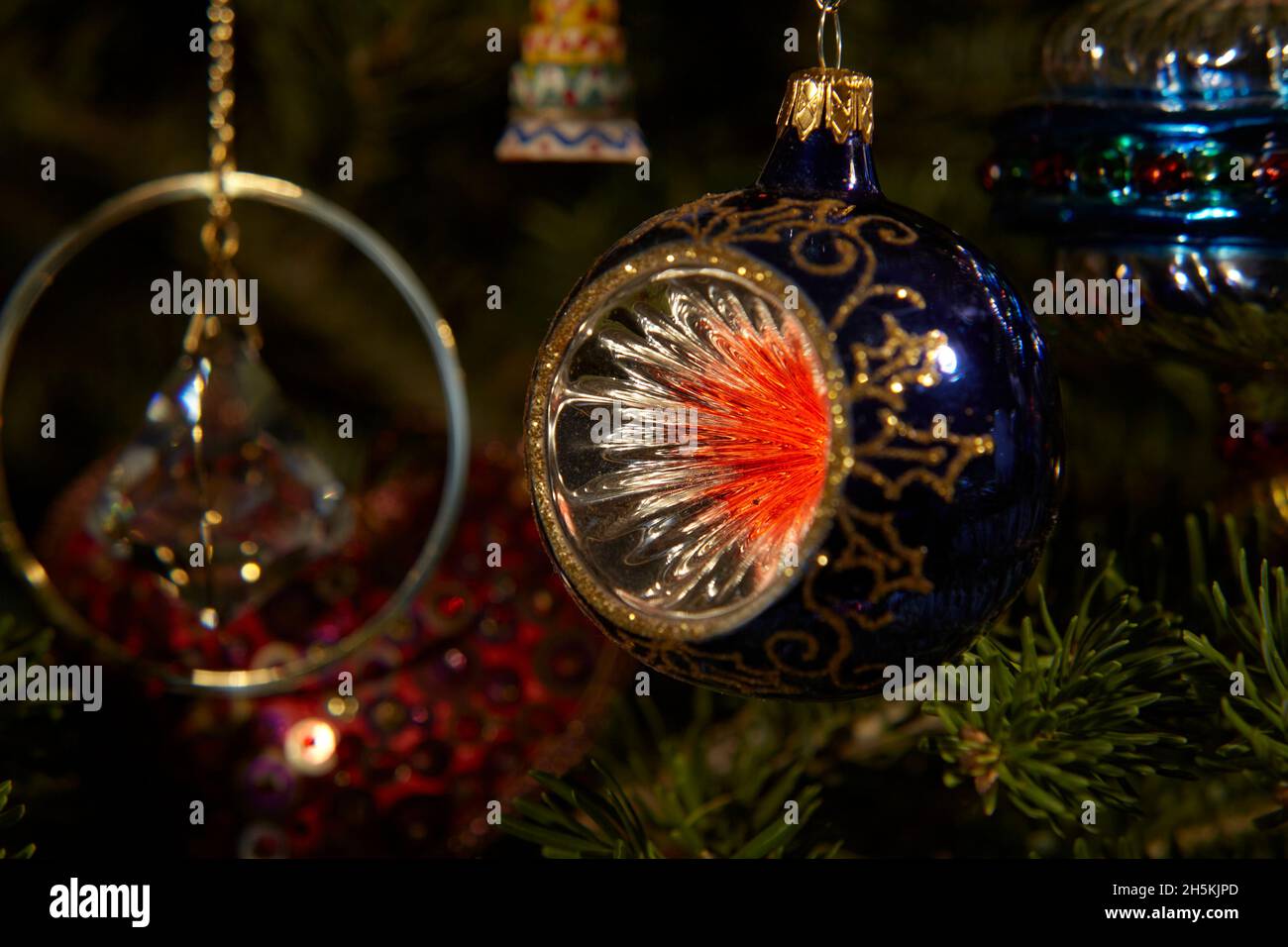 Christmas ornament in an evergreen tree Stock Photo Alamy