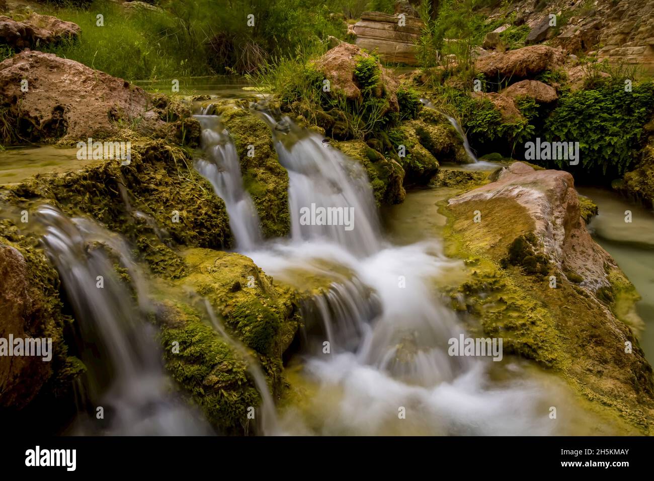 Water spilling over rocks hi-res stock photography and images - Alamy