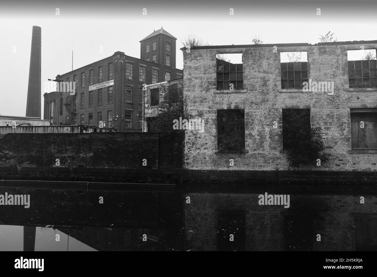 Rochdale, Lancashire, Britain, Uk Old mills overlooking the Rochdale Canal Stock Photo