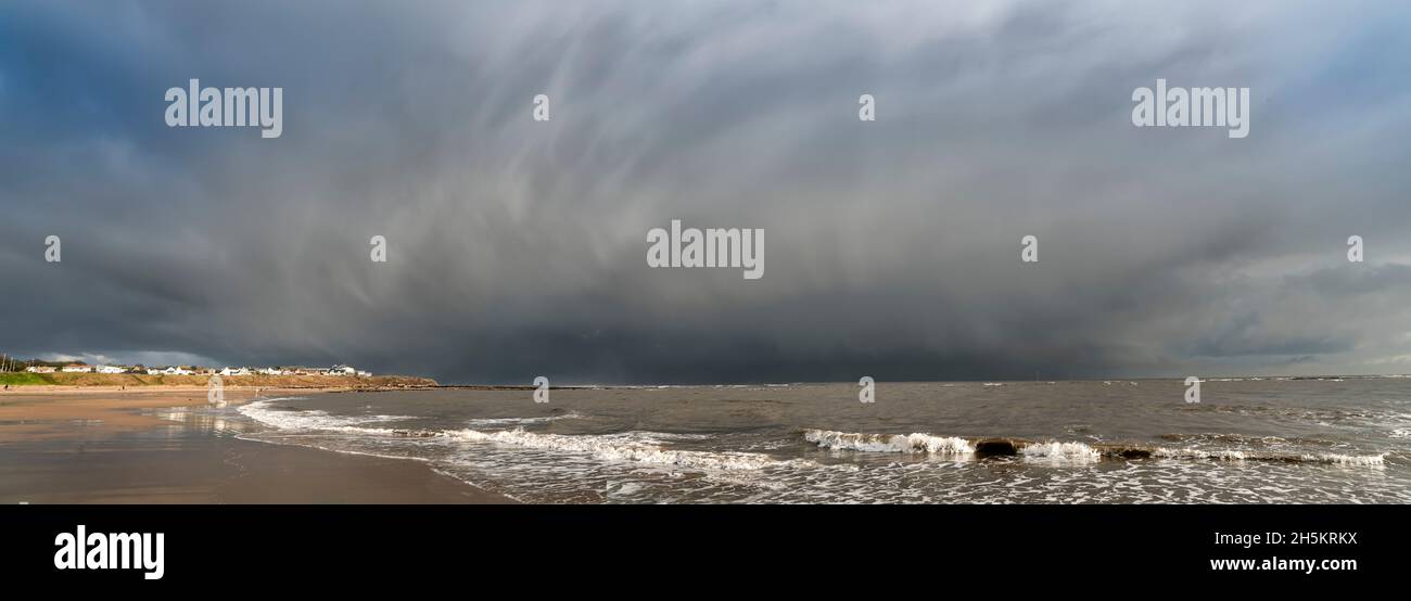 Dramatic storm clouds over the Atlantic Ocean and coastline at Whitburn; Whitburn, Tyne and Wear, England Stock Photo