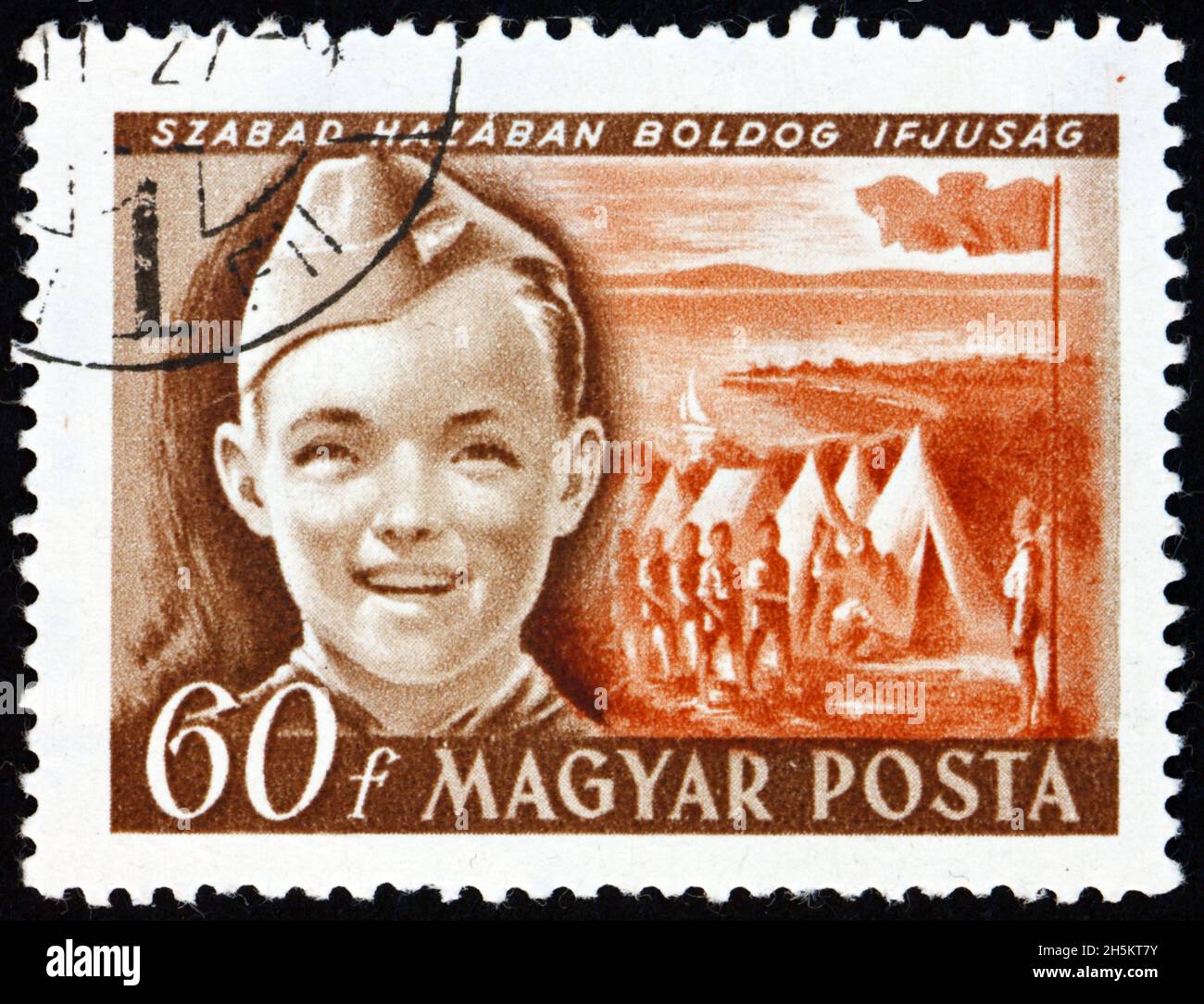 HUNGARY - CIRCA 1950: a stamp printed in Hungary shows pioneer with tent camp, boys camp, International childrens day, circa 1950 Stock Photo