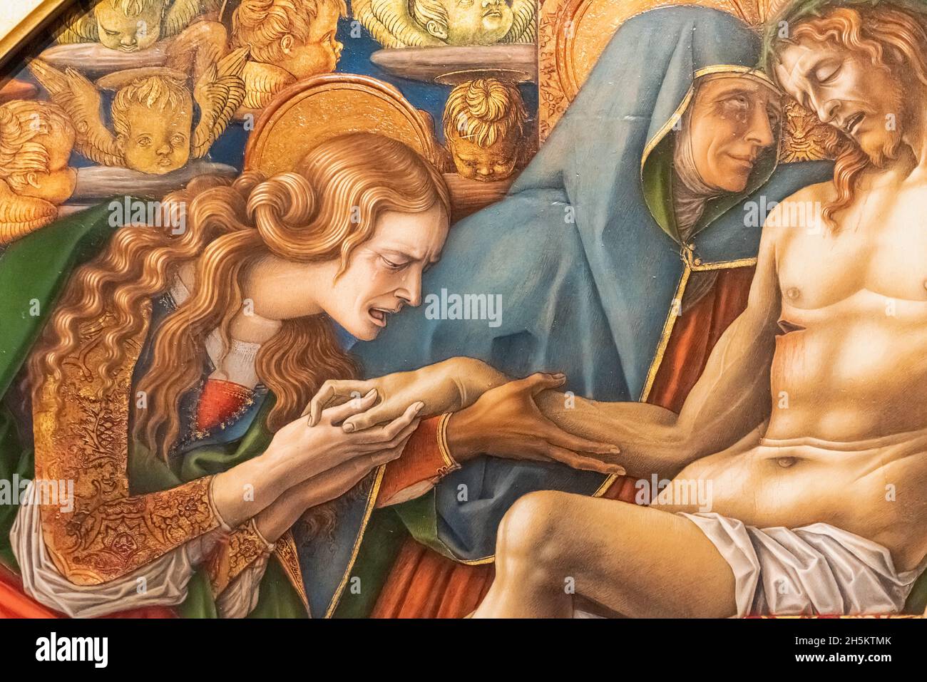Detail of medieval religious painting showing Virgin Mary and Mary Magdalene crying over the dead body of Jesus Stock Photo