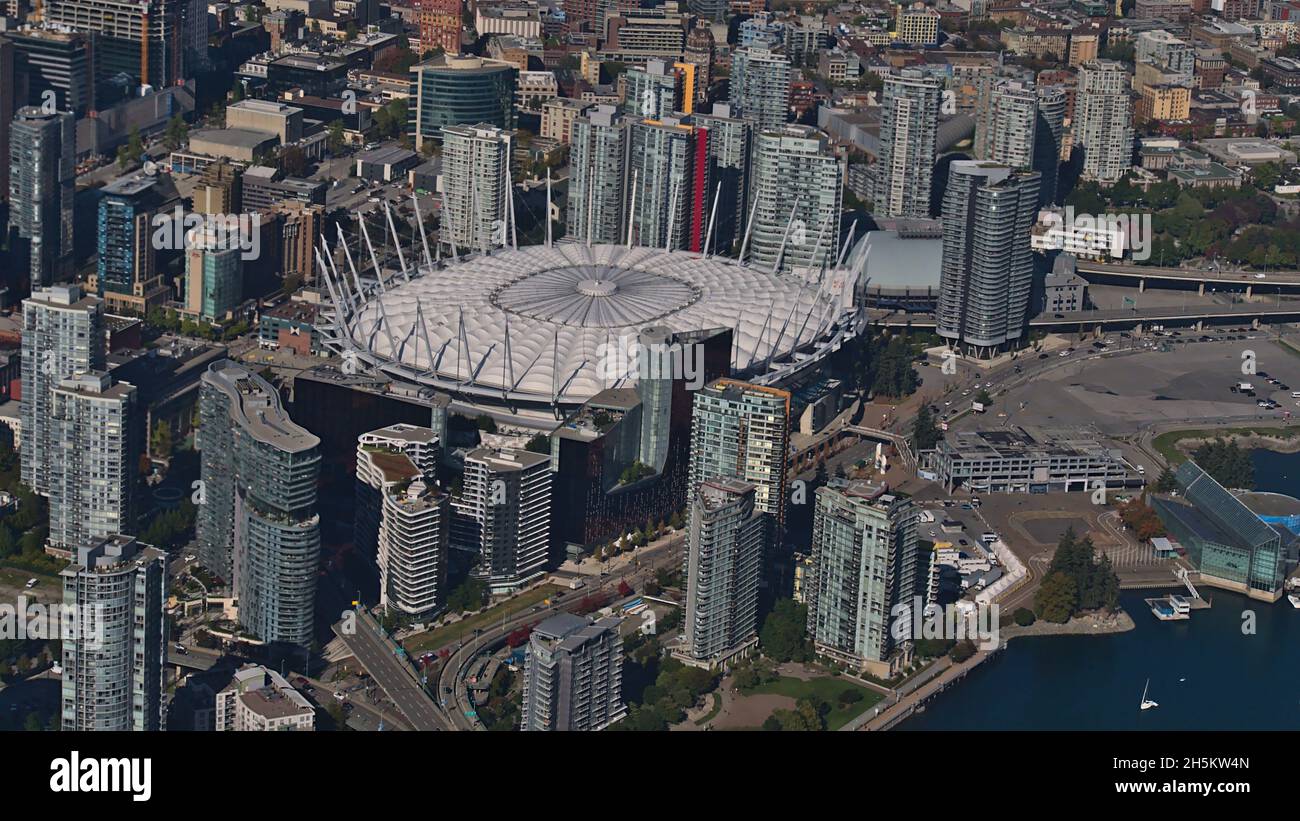 Aerial view of district Yaletown with stadium and high-rise buildings in Vancouver downtown, British Columbia, Canada on sunny day in autumn. Stock Photo