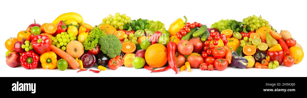 Wide panoramic composition of ripe fruits, berries and vegetables isolated on white background. Stock Photo