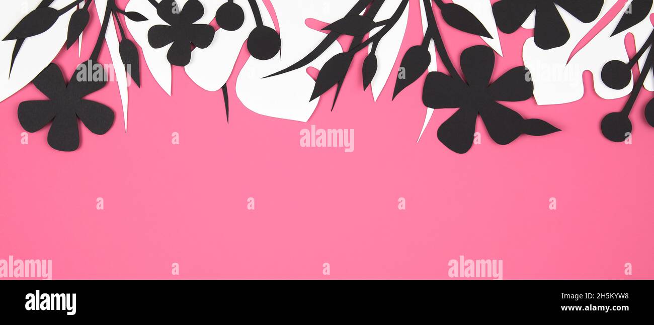 pink banner with white and black floral paper decor Stock Photo