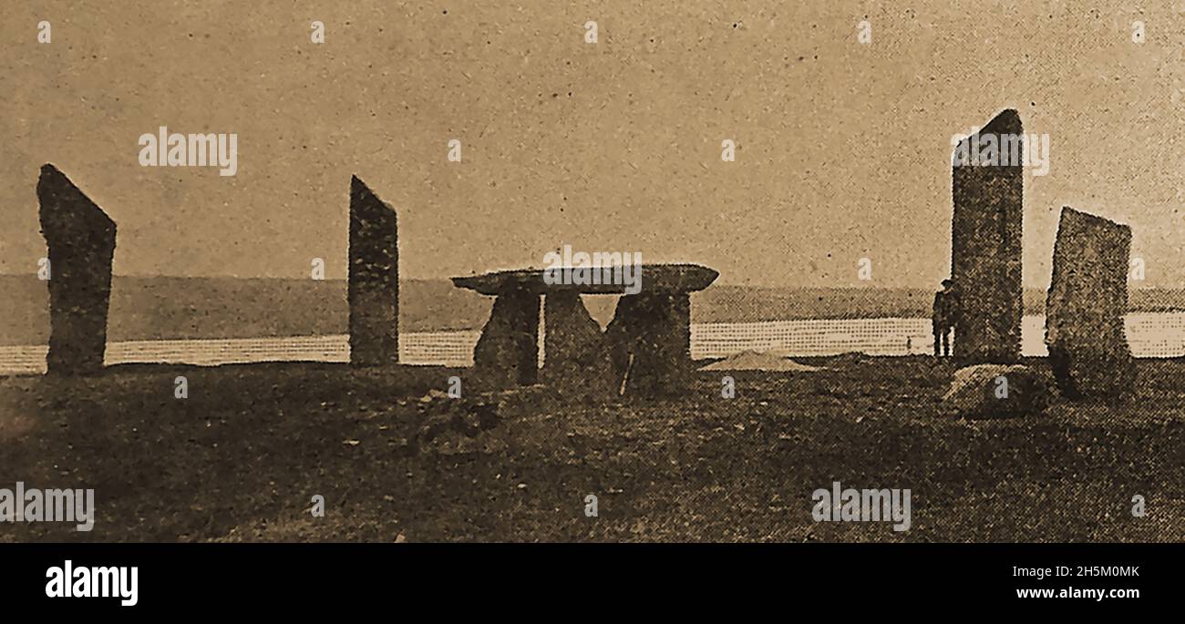 A rare 1908 image of the Stenness stone circle, Orkney, Scotland with a central (now vanished) cromlech, table grave or dolmen/ The remaining stones (4 of an original 12) were once surrounded  by a large ditch and bank, now lost.time by ploughing Stock Photo