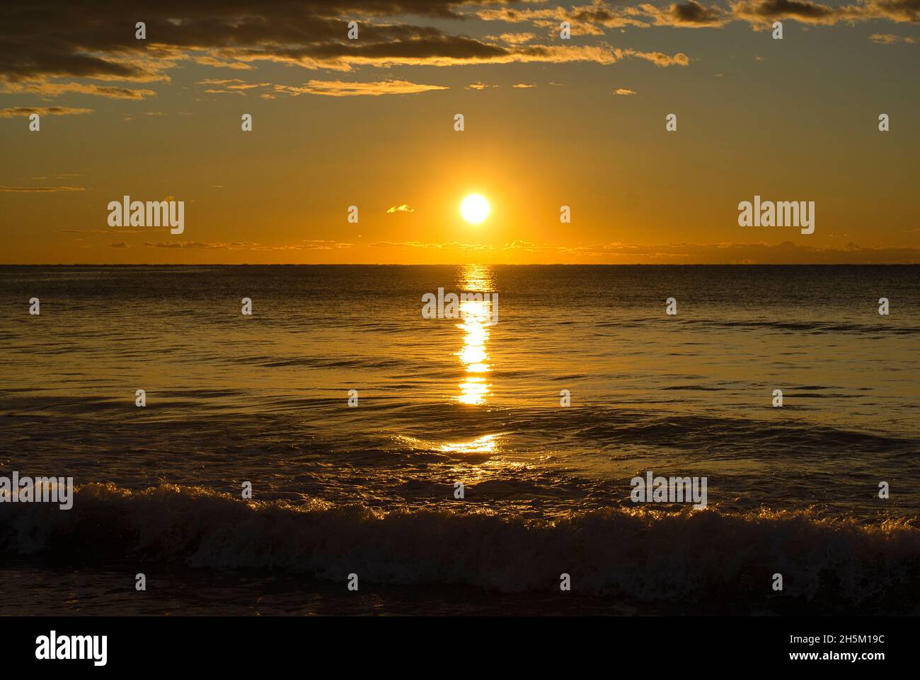 A peaceful sunrise on the beach of the Costa Azahar, Spain Stock Photo