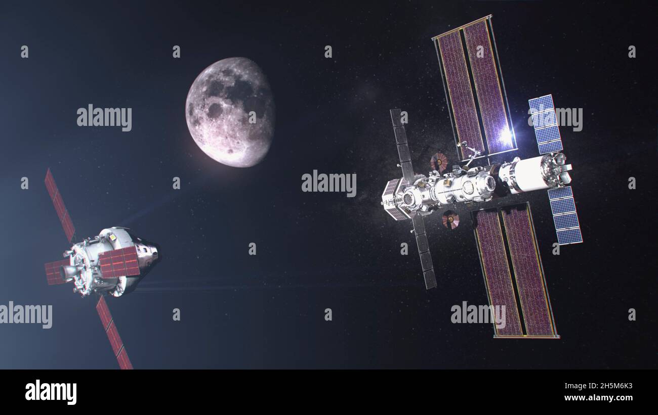 Lunar Orbit, United States of America. 10 November, 2021. Illustration of the SpaceX Gateway space station in lunar orbit as the Artemis spaceship approaches. The Gateway will serve as a transfer station between the Orion spacecraft and the lunar lander on Artemis missions to the moon. NASA Administrator Bill Nelson announced November 9, 2021 that the Artemis missions will proceed with crewed flight tests expected by 2024. Credit: NASA/NASA/Alamy Live News Stock Photo