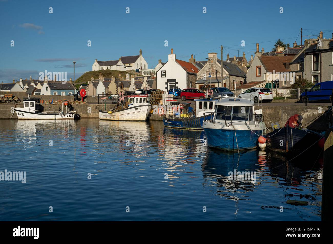 FINDOCHTY MORAY COAST SCOTLAND FISHING BOATS INSIDE THE HARBOUR WHITE