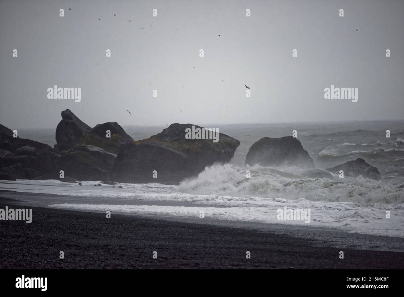 The Reynisdrangar Basalt Sea Stacks And The Reynisfjara Black Sand