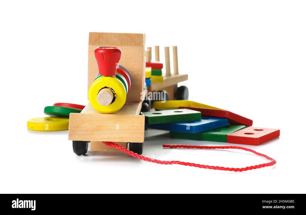 Toy train with building blocks on white background Stock Photo - Alamy