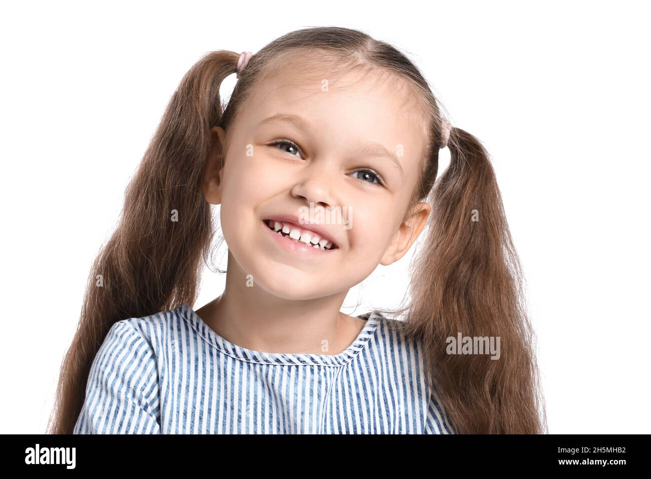 Portrait of pretty happy little girl on white background Stock Photo ...