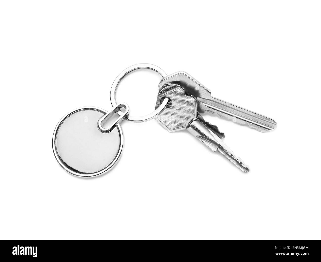 Stylish round keychain with keys on white background Stock Photo - Alamy