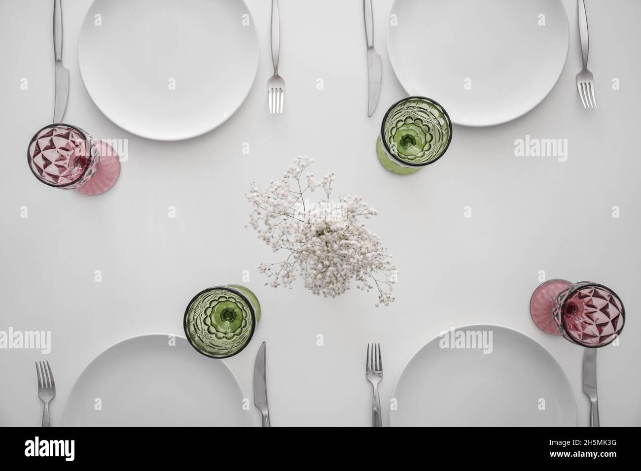 Stylish table setting on white background Stock Photo - Alamy