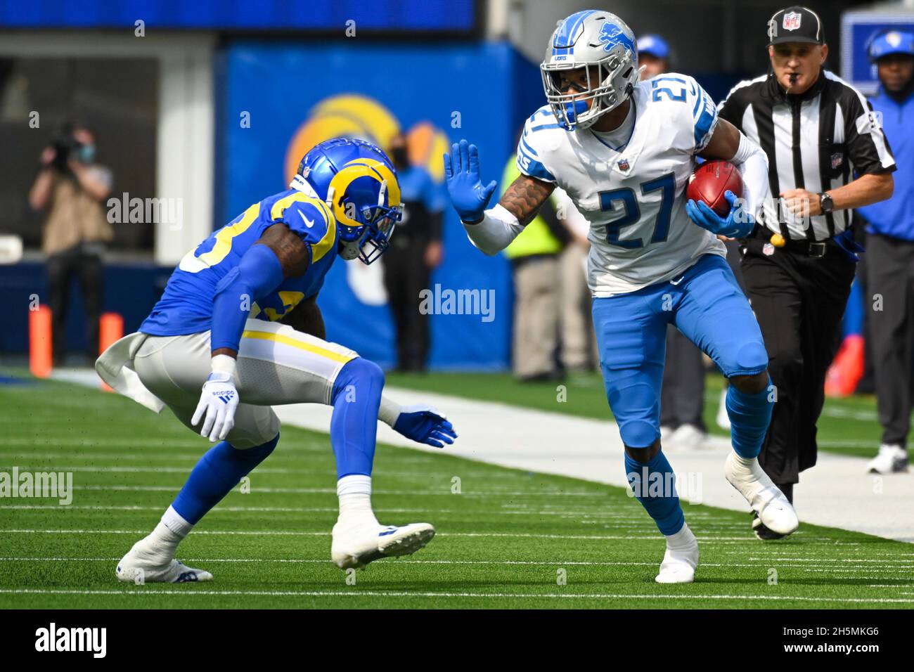 Los Angeles Rams safety Nick Scott (33) tackles Detroit Lions cornerback Bobby Price (27) during an NFL game, Sunday, Oct. 24, 2021, in Los Angeles. T Stock Photo