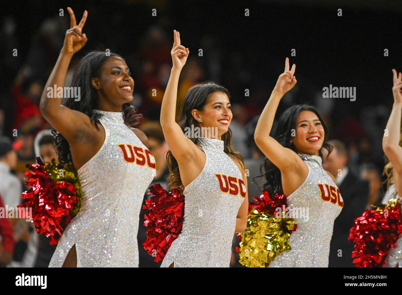 The Southern California Trojans cheer team during an NCAA college basketball game between the Southern California Trojans and the Cal State Northridge Stock Photo