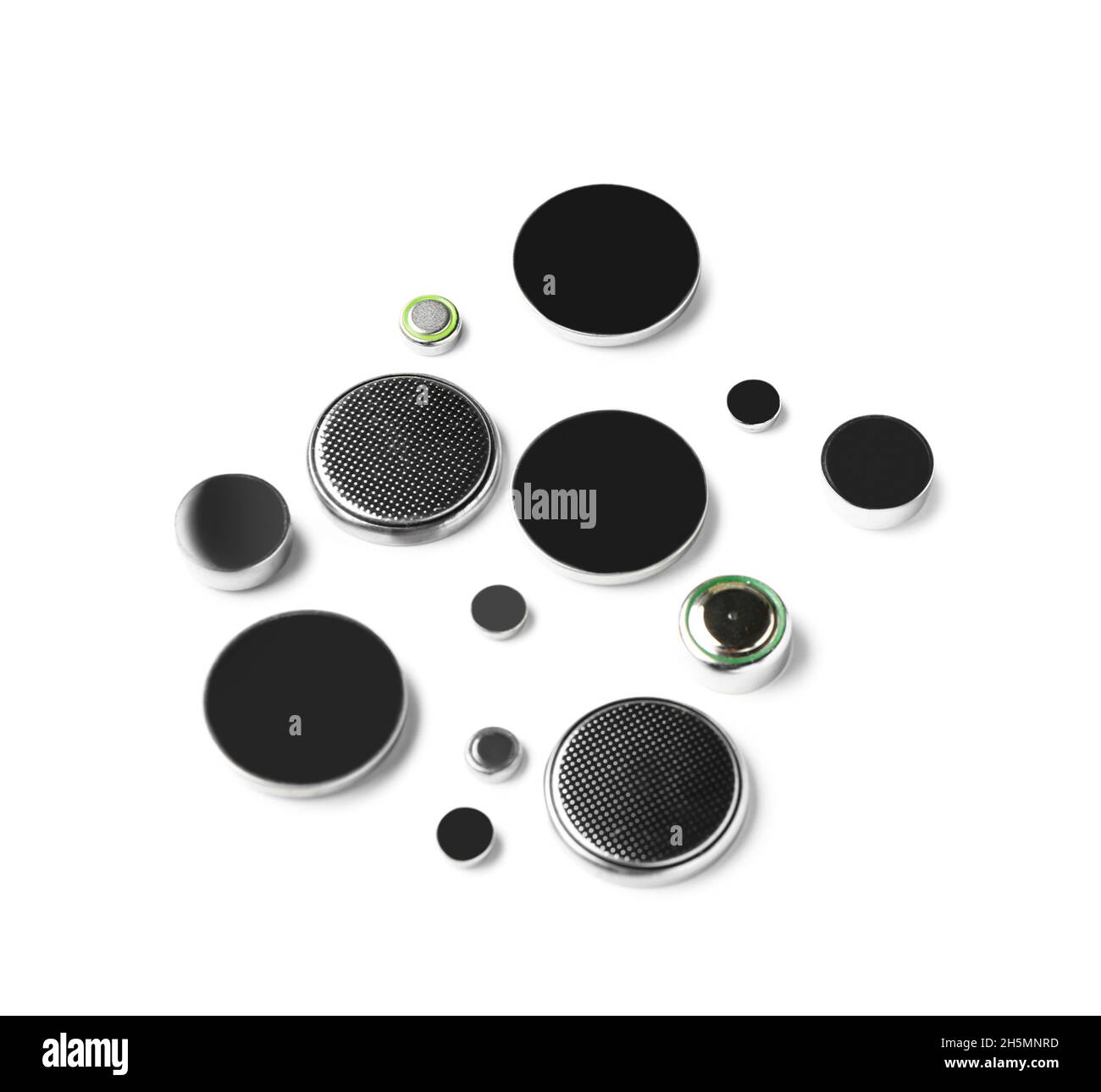 Lithium button cell batteries on white background Stock Photo - Alamy