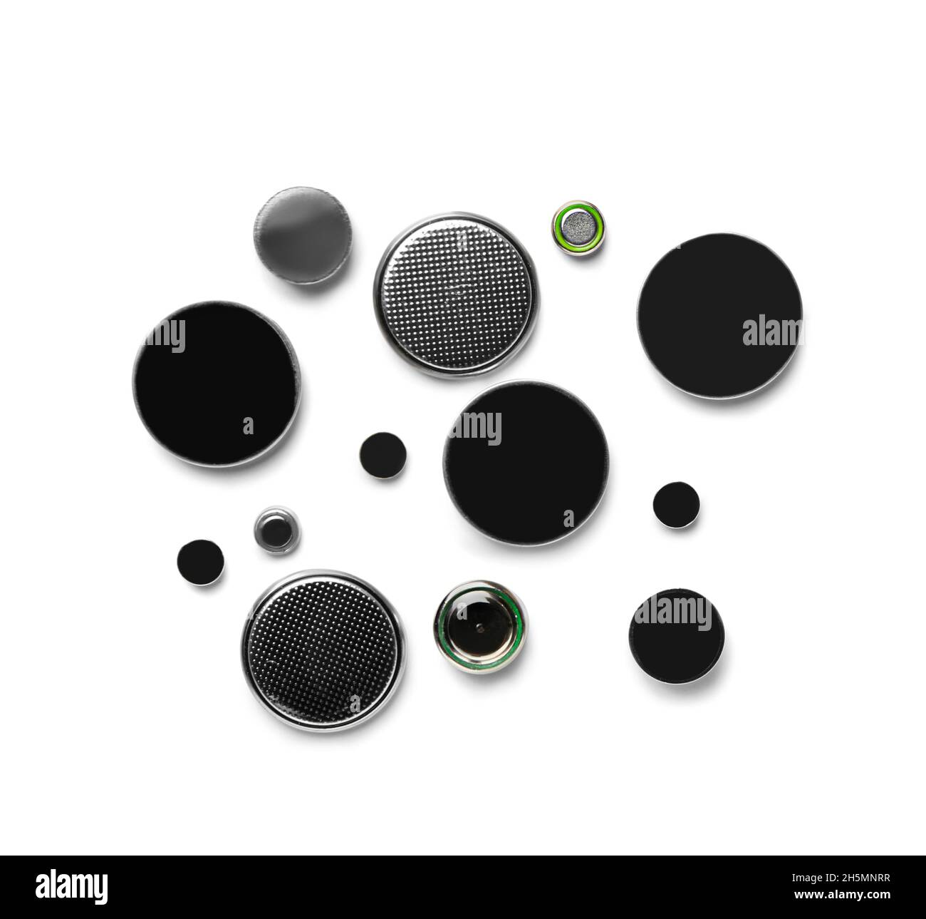 Lithium button cell batteries on white background Stock Photo - Alamy
