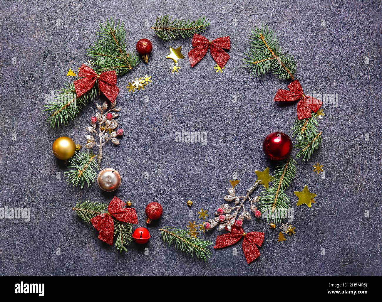Frame made of fir branches and Christmas decor on dark background Stock ...