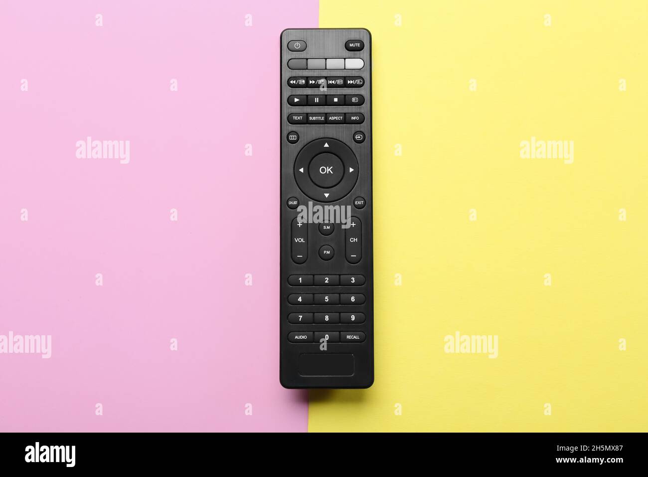Modern TV remote control on color background Stock Photo - Alamy