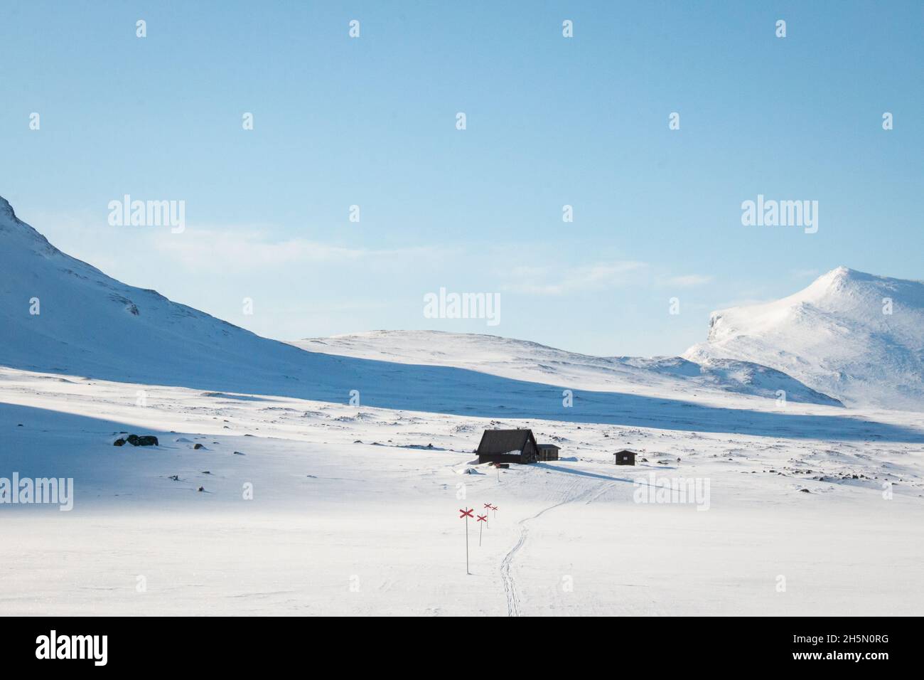 An emergency hut in the snow along Kungsleden trail between Salka and Kebnekaise, early April 2021 Stock Photo