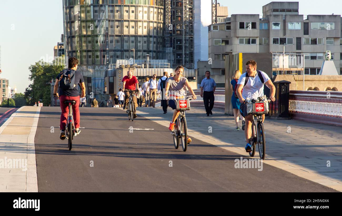 London, England, UK - July 19, 2016: Cyclists ride across Blackfriars Bridge on London's newly opened North-South Cycle Superhighway. Stock Photo