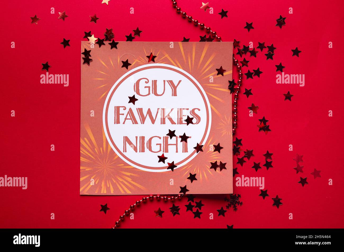 Greeting card for Guy Fawkes night on red background Stock Photo - Alamy