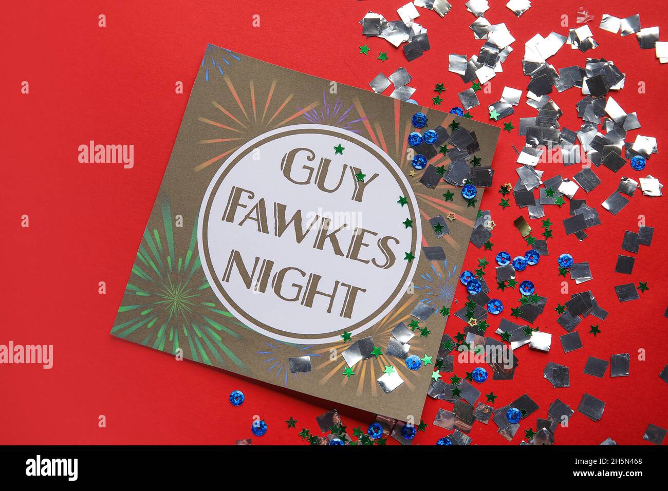 Greeting card for Guy Fawkes night on red background Stock Photo - Alamy