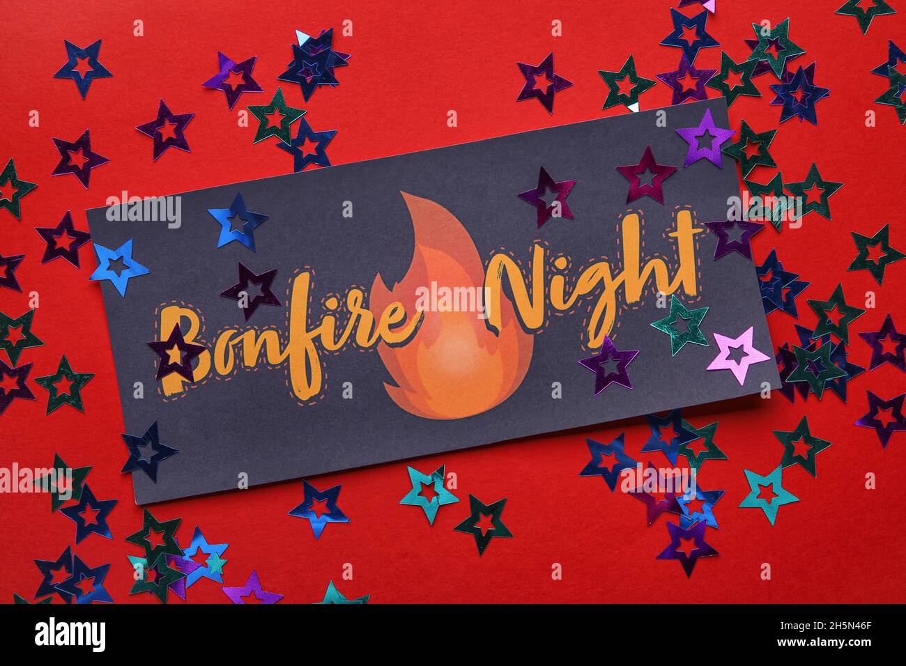 Greeting card for Guy Fawkes night on red background Stock Photo - Alamy