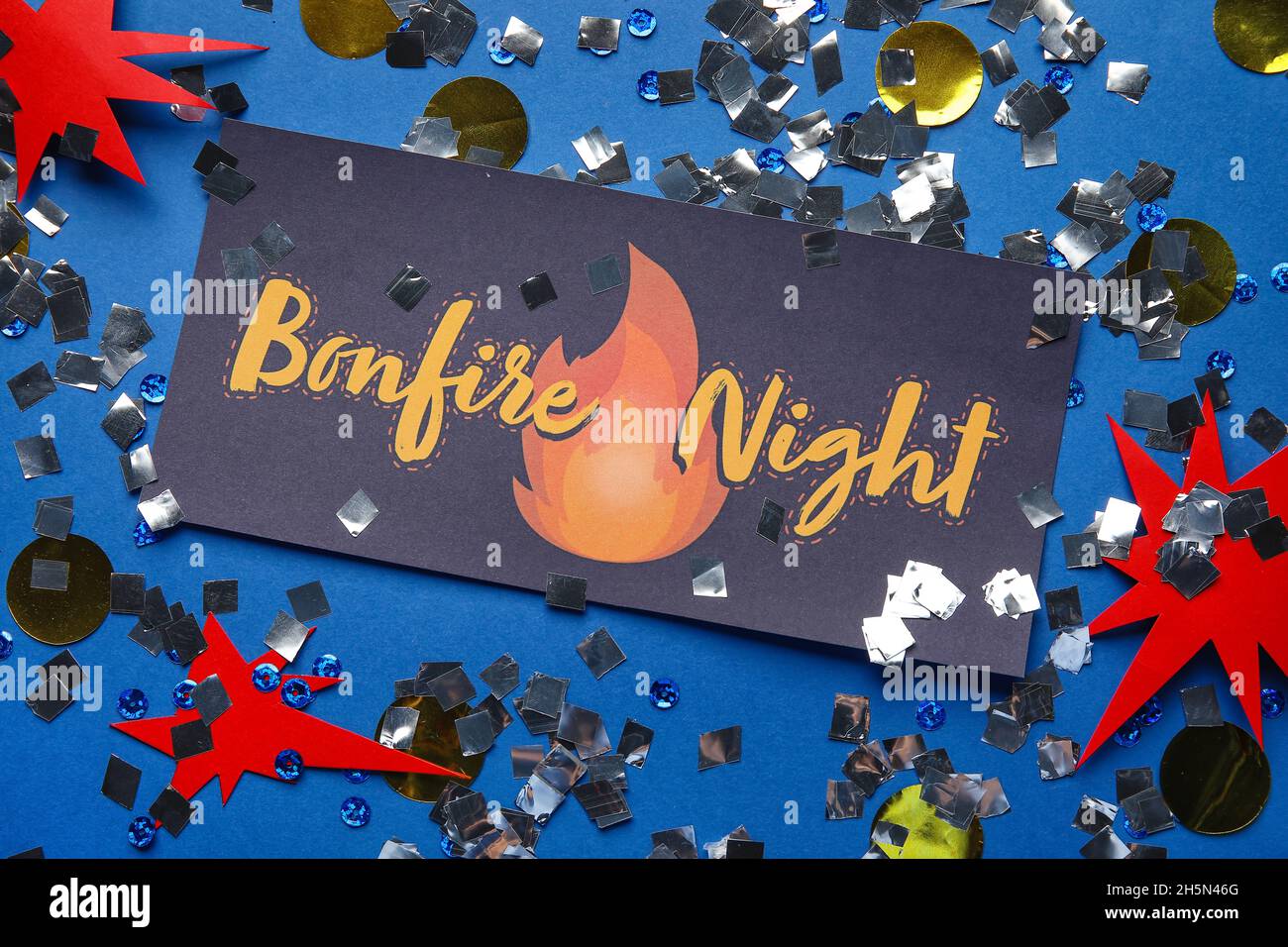 Greeting card for Guy Fawkes night on blue background Stock Photo - Alamy