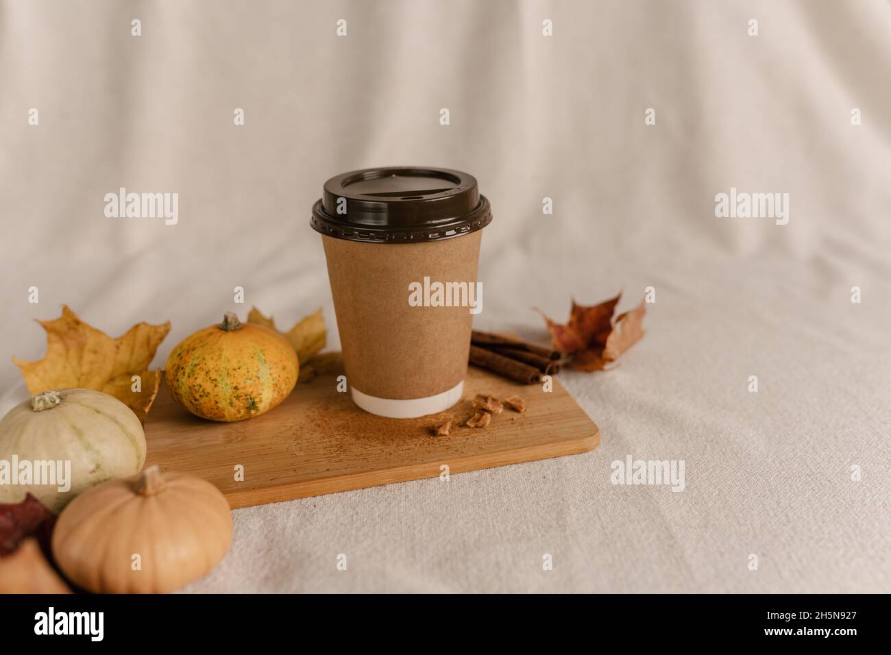 Coffee Take Away Cup in Autumn Pumpkin Set Up. Pumpkin spice latte with ...