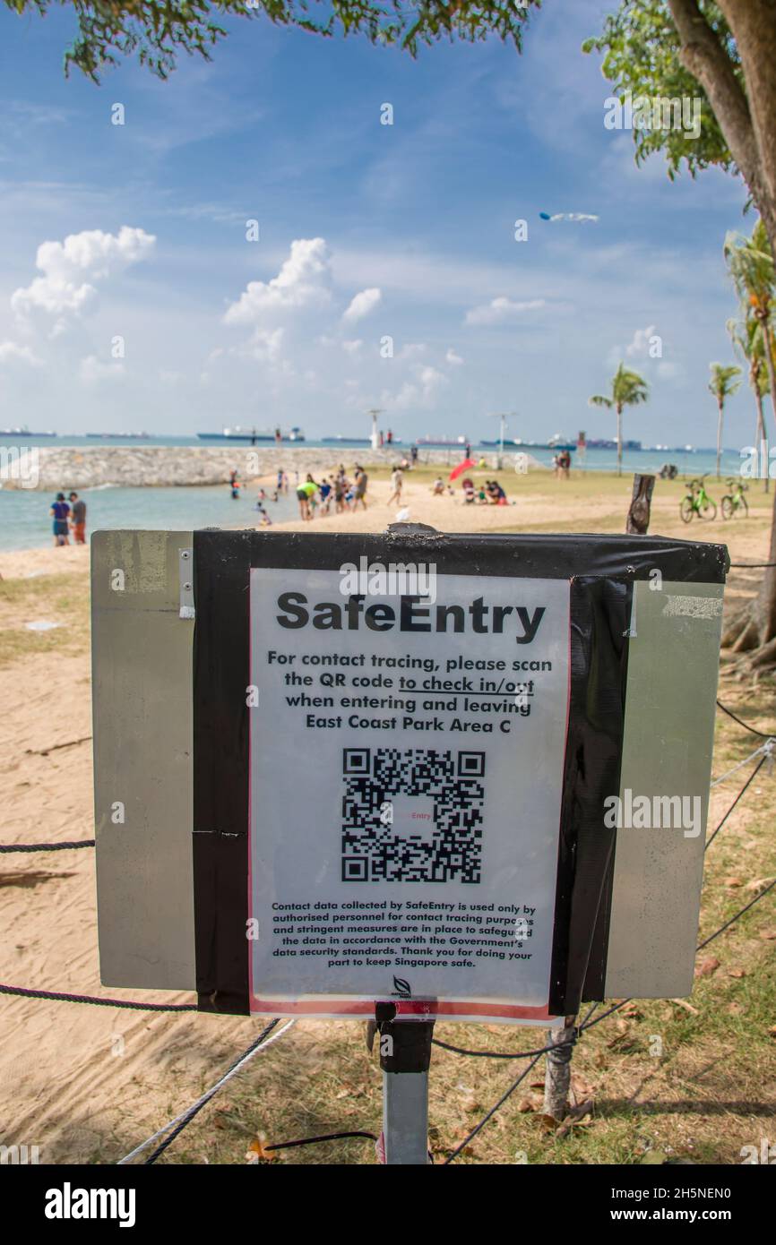 The SafeEntry code at the entrance of Singapore East coast park beach.  It allows to check in visitors with just a scan, and supports verification. Stock Photo