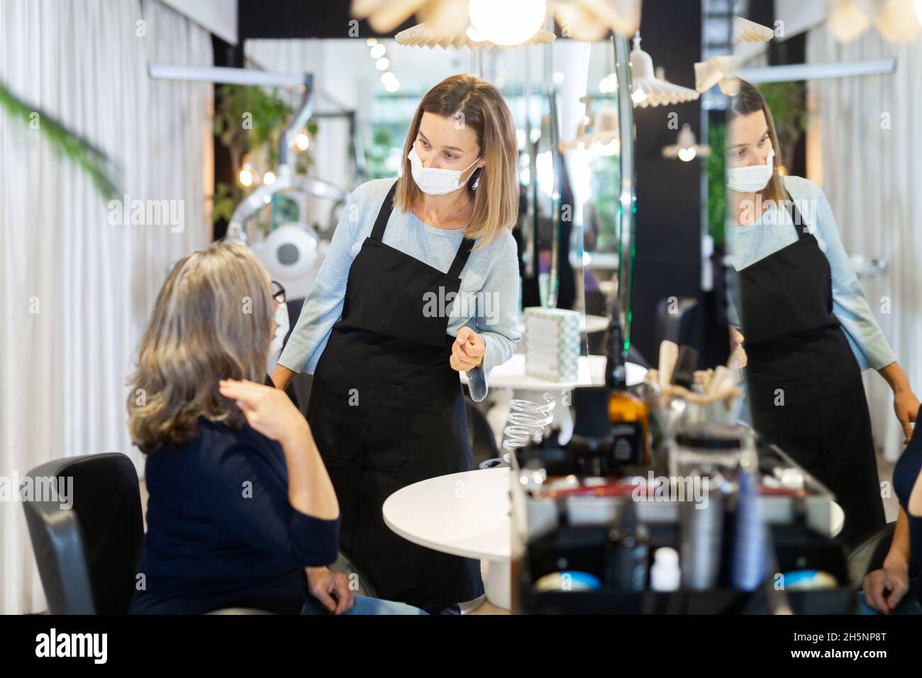 Professional hair stylist in hi-res stock photography and images - Alamy