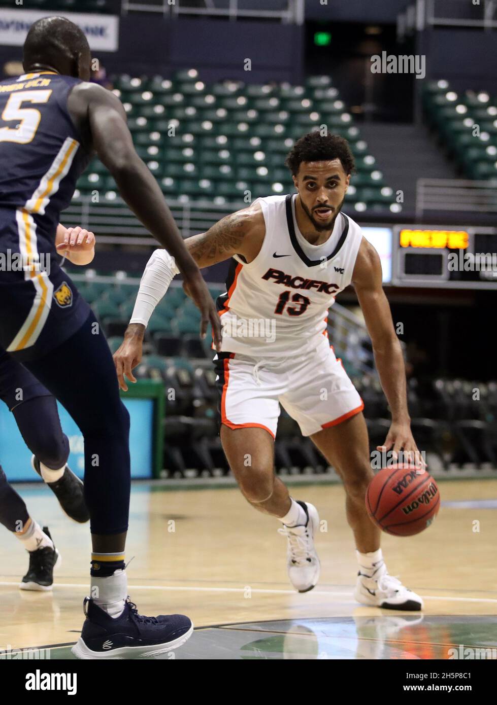 November 10, 2021 - Pacific Tigers forward Jeremiah Bailey #13 drives the lane in a game between the Pacific Tigers and the Northern Colorado Bears during the Rainbow Classic at the SimpliFi Arena at the Stan Sheriff Center in Honolulu, HI - Michael Sullivan/CSM Stock Photo