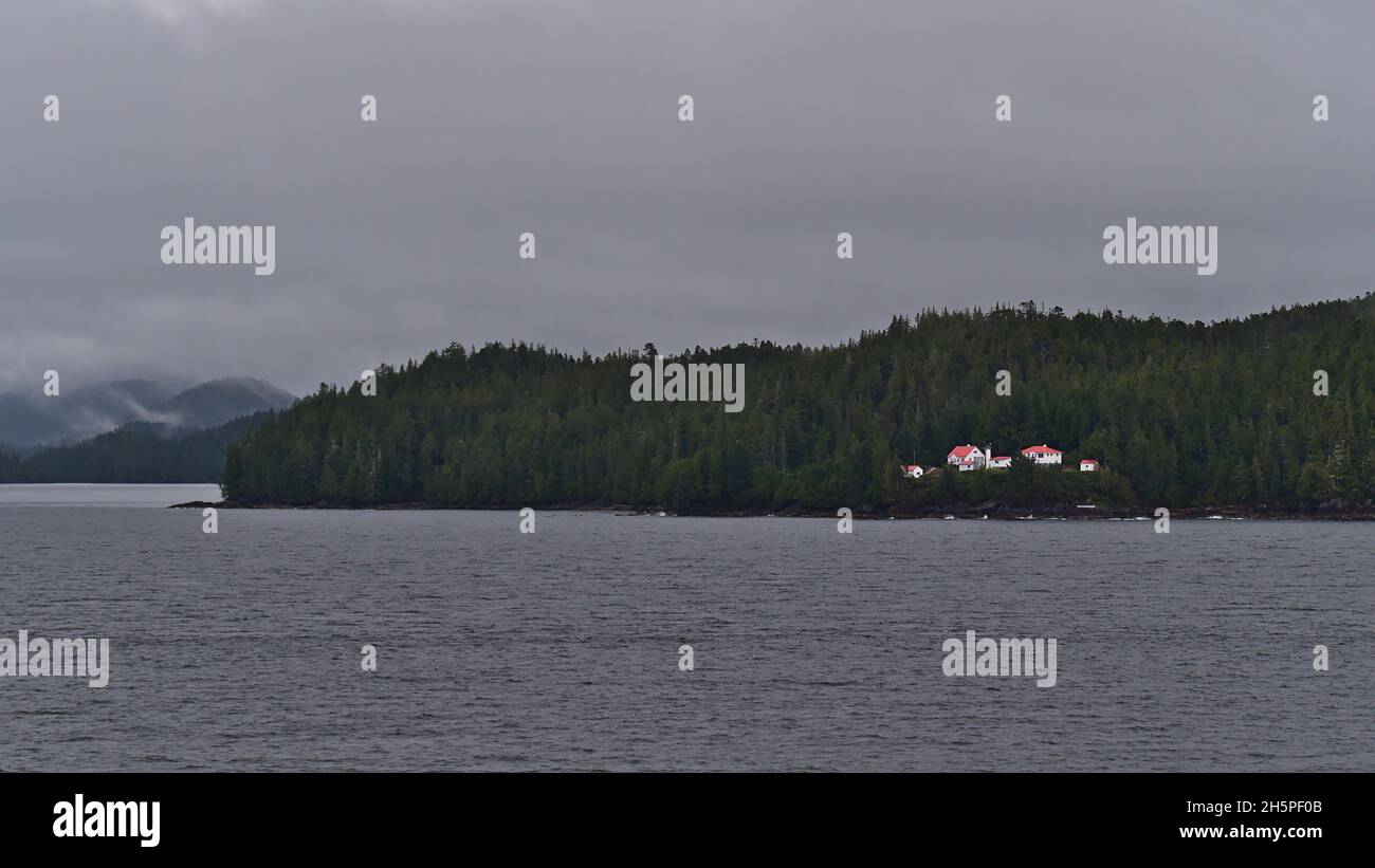 Remote Addenbroke Island Lighthouse on the coast of Fitz Hugh Sound, Pacific Ocean part of Inside Passage in British Columbia, Canada. Stock Photo