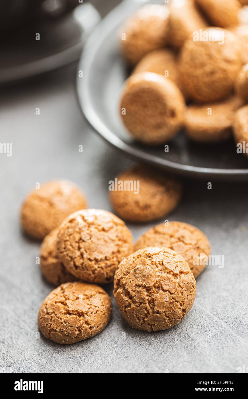 Amaretti biscuits. Sweet italian almond cookies on kitchen table Stock  Photo - Alamy