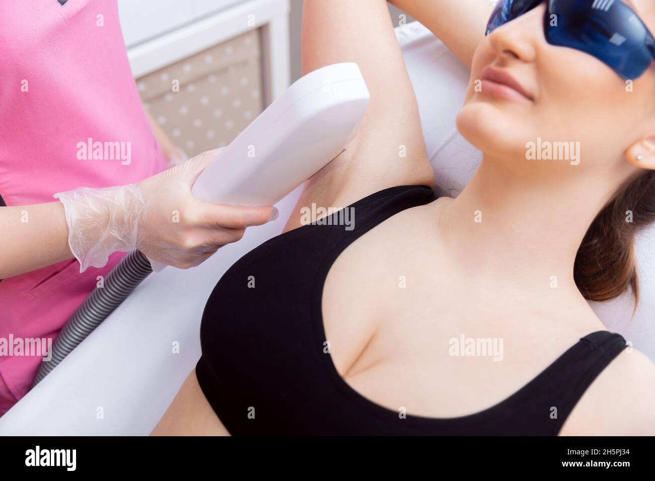 Closeup Underarm laser hair removal treatment body care woman Stock