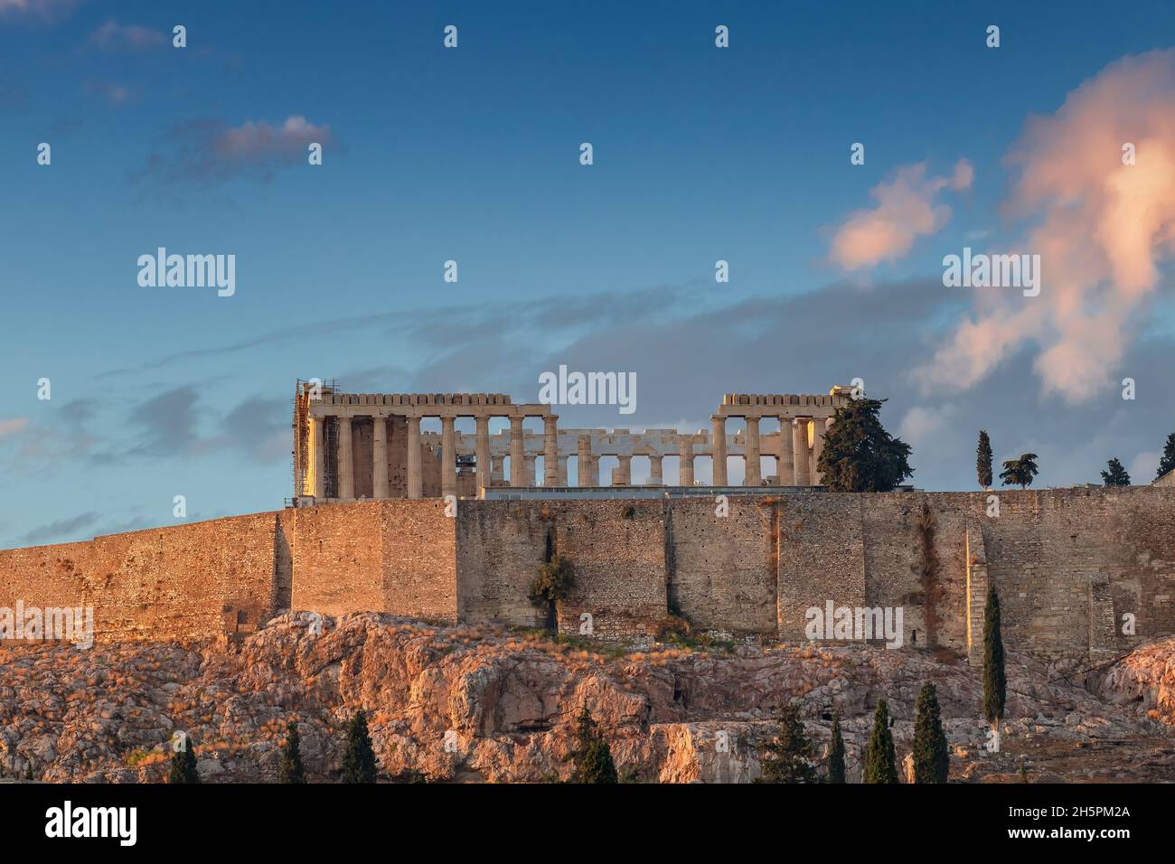 Beautiful view of Parthenon temple at sunset in Acropolis in Athens, Greece Stock Photo