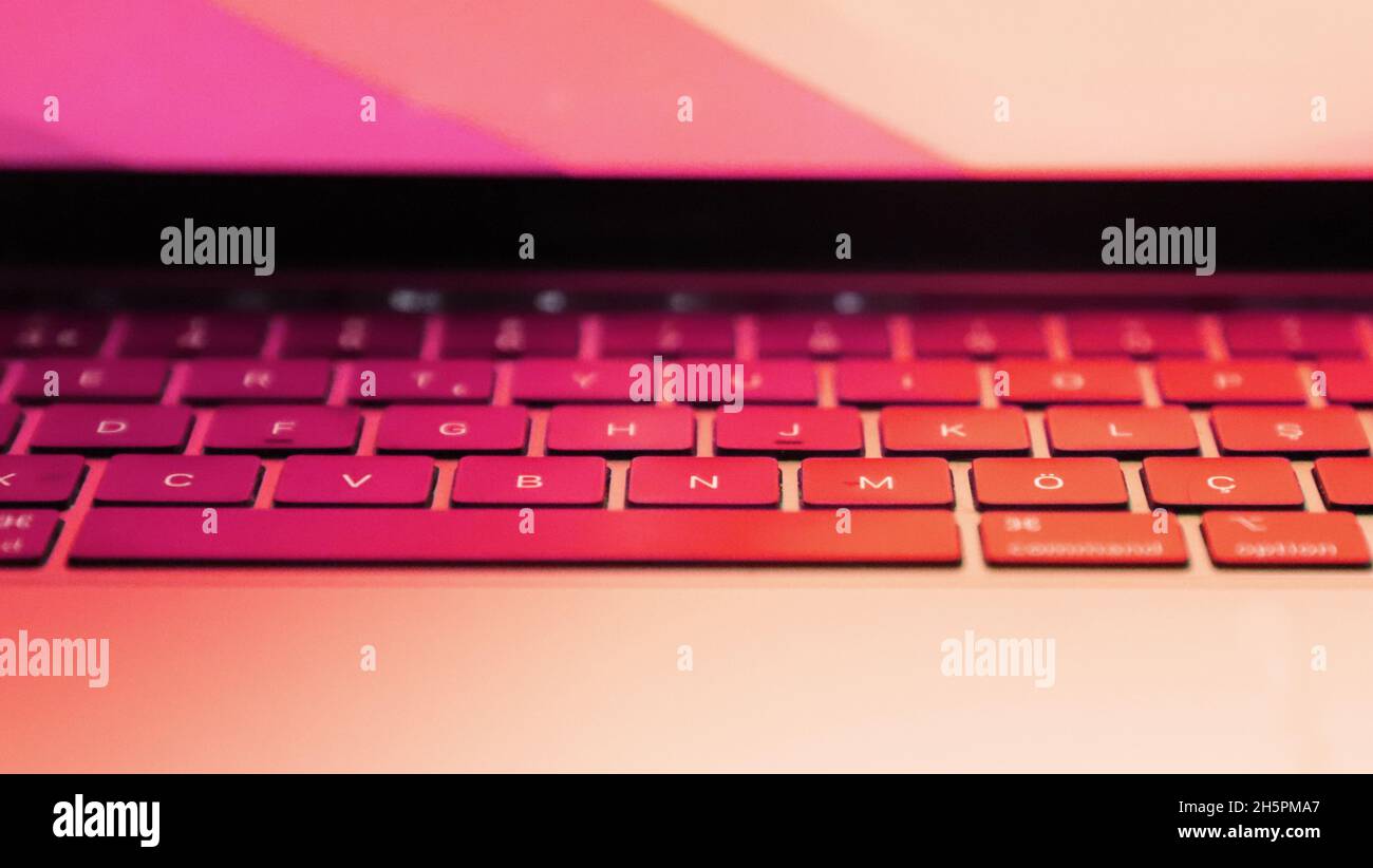 close-up laptop keyboard with warm light. copy space. selective focus photo. turkish alphabet. Stock Photo