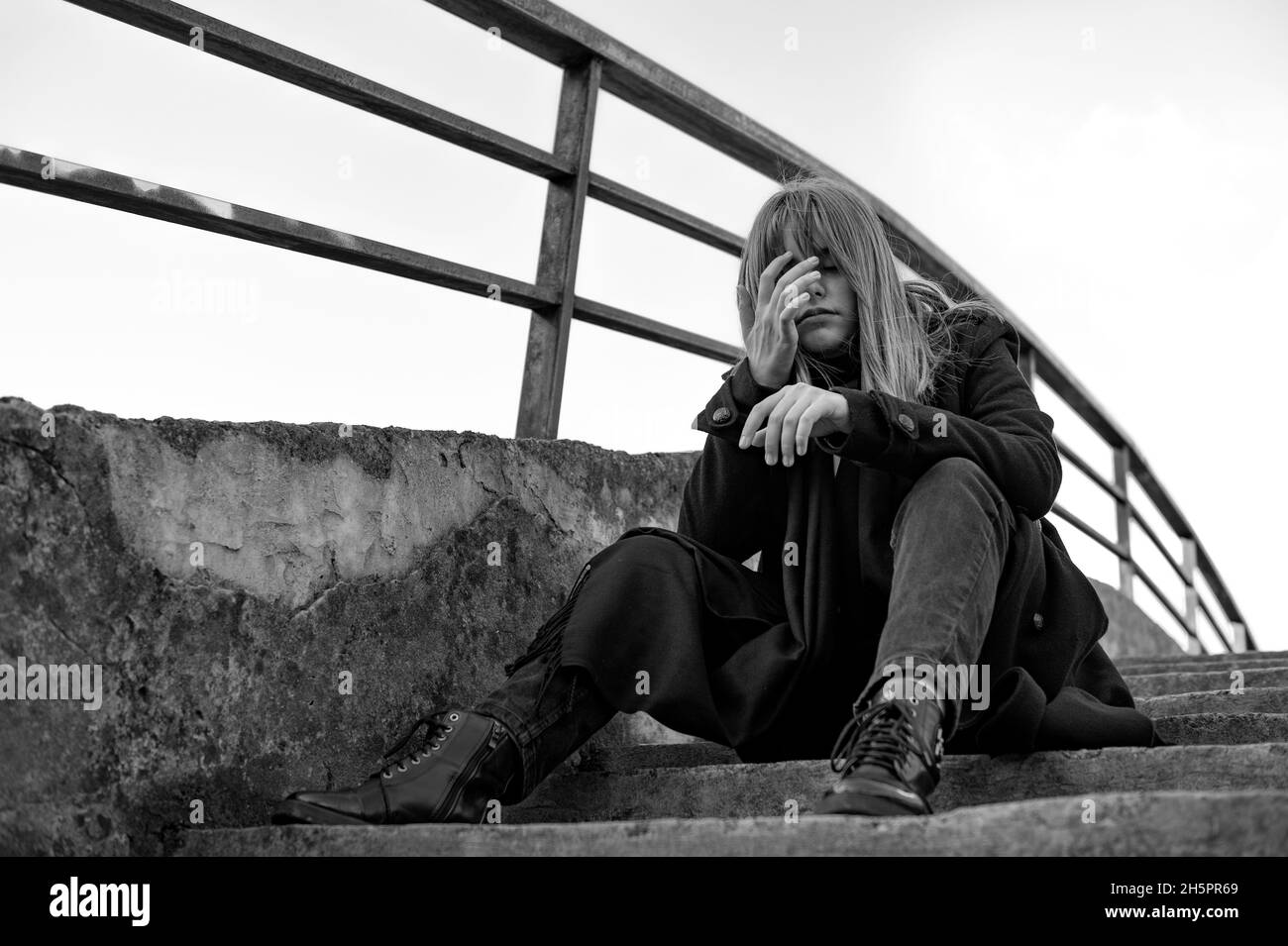 Black and white portrait of sad suffering teenage girl. Teenage girl with problems. Sad depressed woman suffering Stock Photo