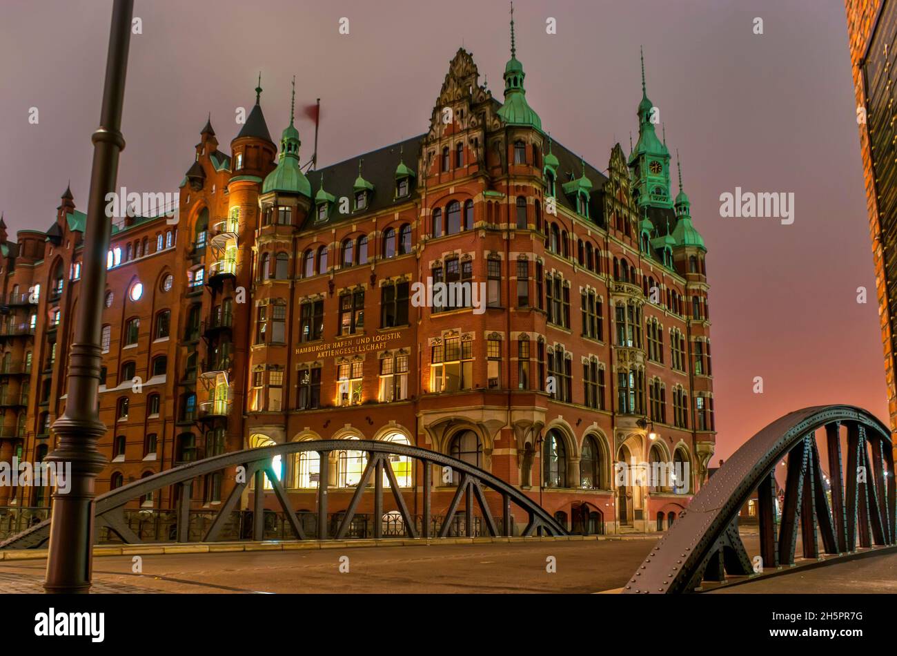 HAMBURG, GERMANY - NOVEMBER 20, 2019: The historical facade of Hamburger Hafen und Logictik company, located in Speicherstadt district, on Nov 20 in H Stock Photo