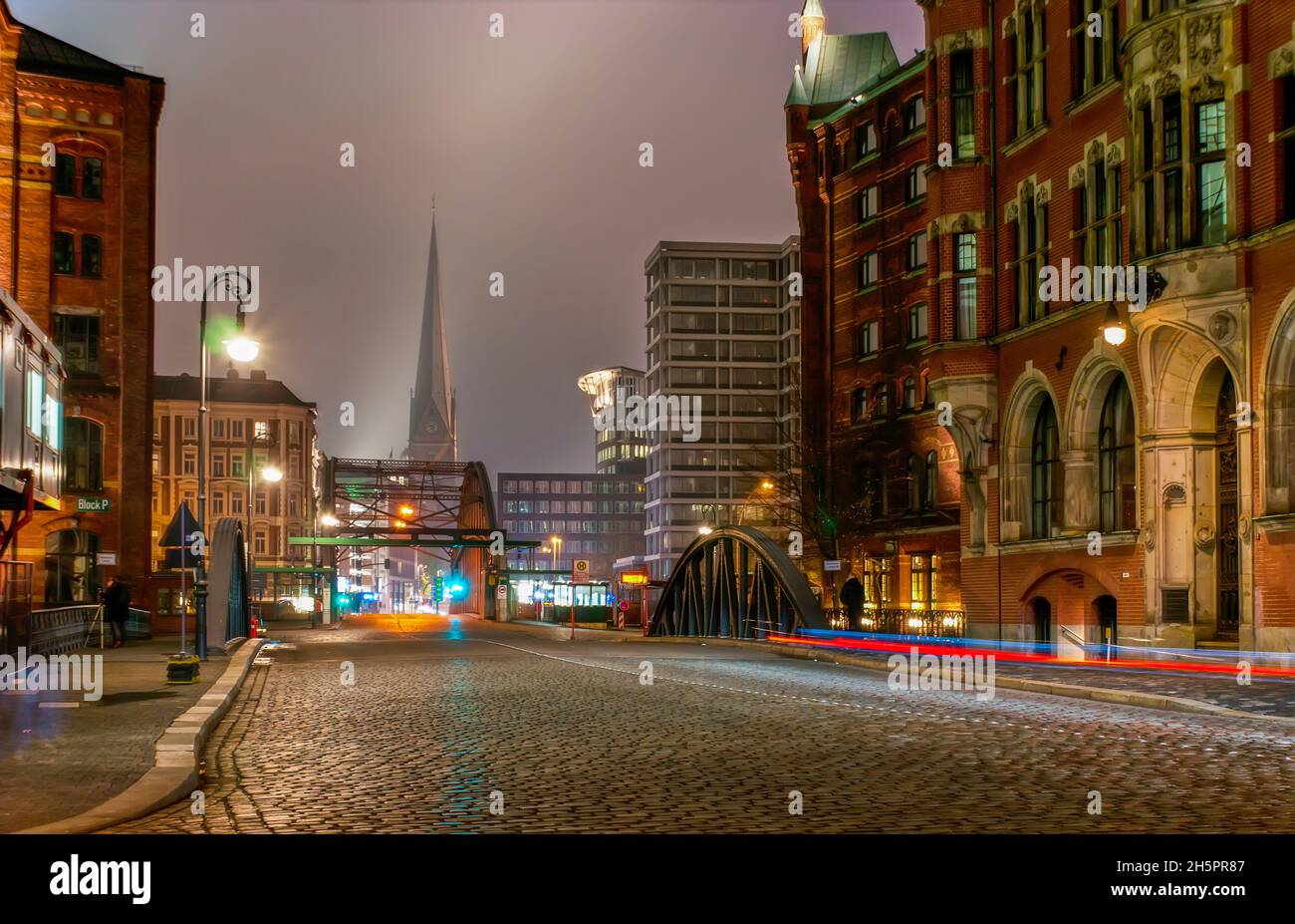 The misty night in picturesque Speicherstadt district of Hamburg, Germany Stock Photo