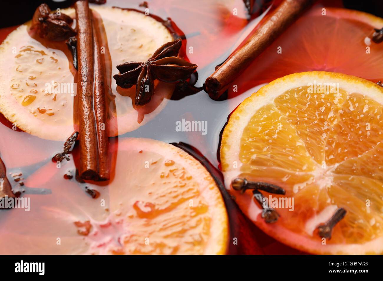 Mulled wine all over background, close up Stock Photo