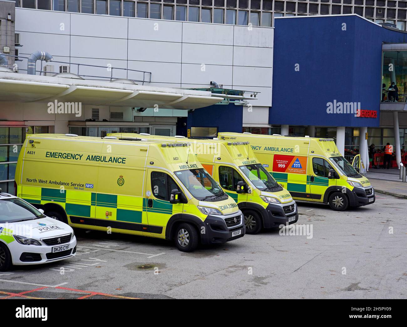 Ambulances parked outside the Emergency Department at the Royal Liverpool Hospital in Merseyside. Paramedics have said that patients are 'at risk' from record ambulance delays as average waiting times for callouts to potentially serious conditions are twice the national standard. Figures from NHS England show the mean response time to Category 2 calls, which include stroke and other emergencies, was more than 45 minutes in September, compared with a target average of 18 minutes. Picture date: Thursday November 11, 2021. Stock Photo