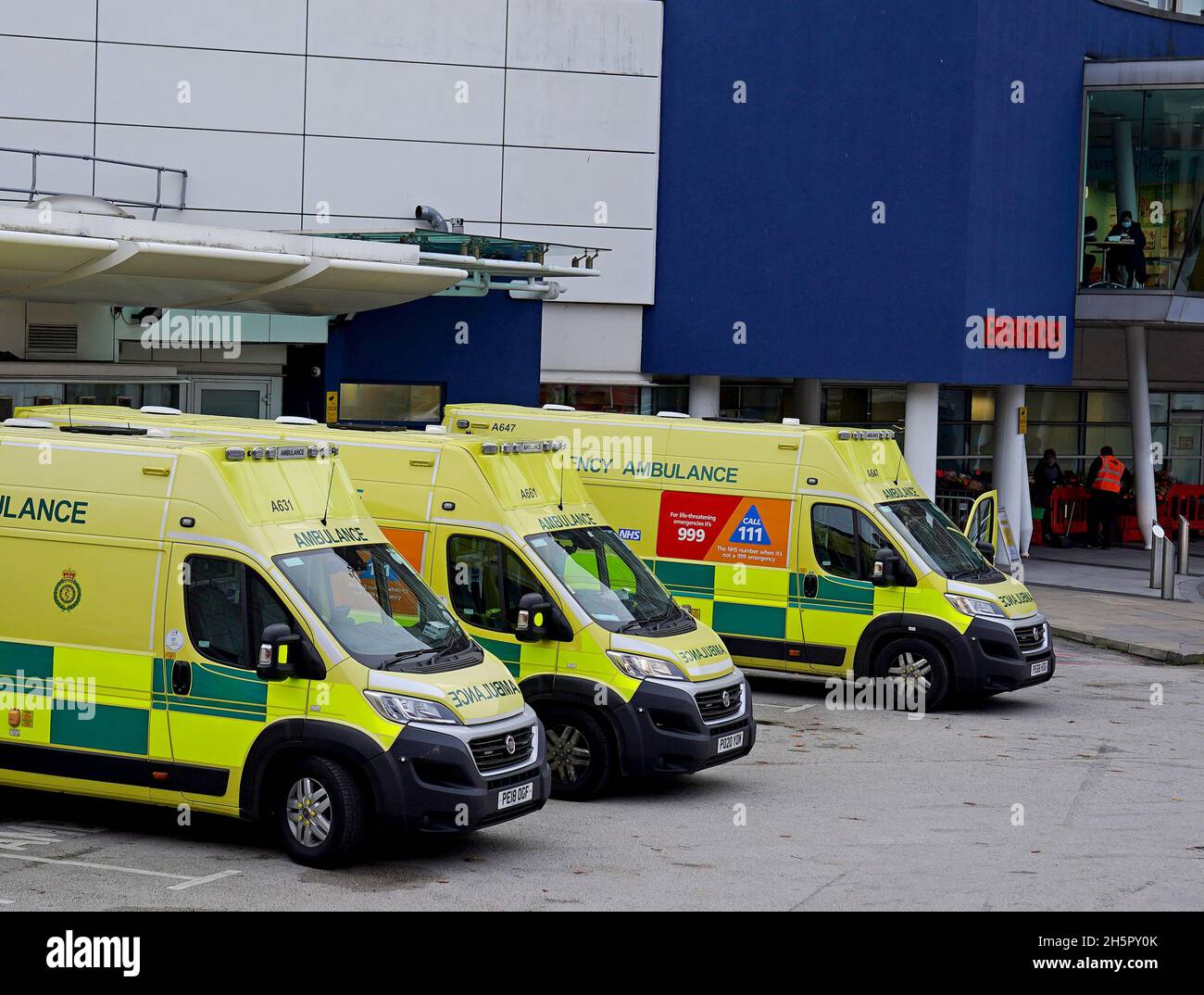 Ambulances parked outside the Emergency Department at the Royal Liverpool Hospital in Merseyside. Paramedics have said that patients are 'at risk' from record ambulance delays as average waiting times for callouts to potentially serious conditions are twice the national standard. Figures from NHS England show the mean response time to Category 2 calls, which include stroke and other emergencies, was more than 45 minutes in September, compared with a target average of 18 minutes. Picture date: Thursday November 11, 2021. Stock Photo