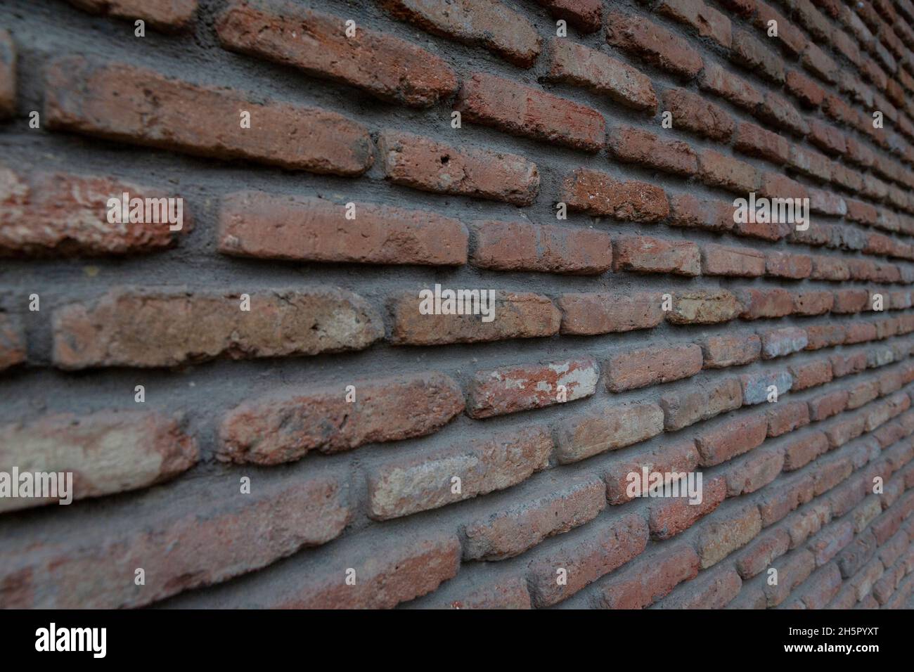 Red background of old vintage brick wall texture. Close up view of old ...